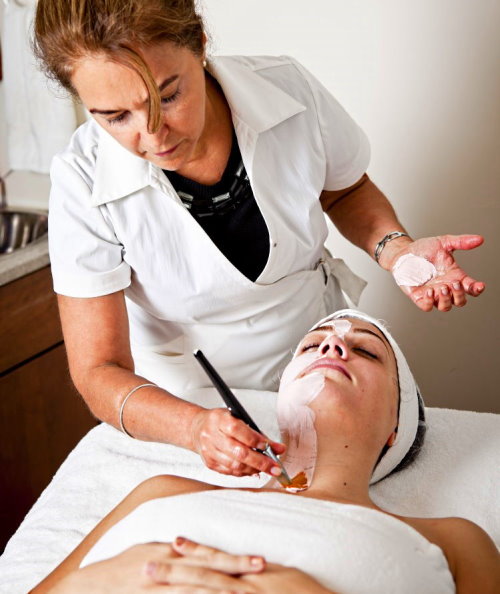 Client during facial treatment at Cleise Spa in Chicago